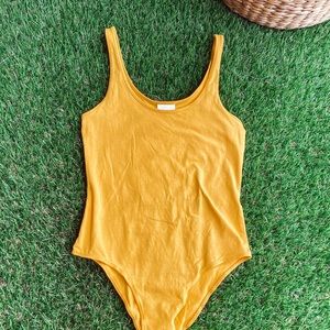 Yellow bodysuit